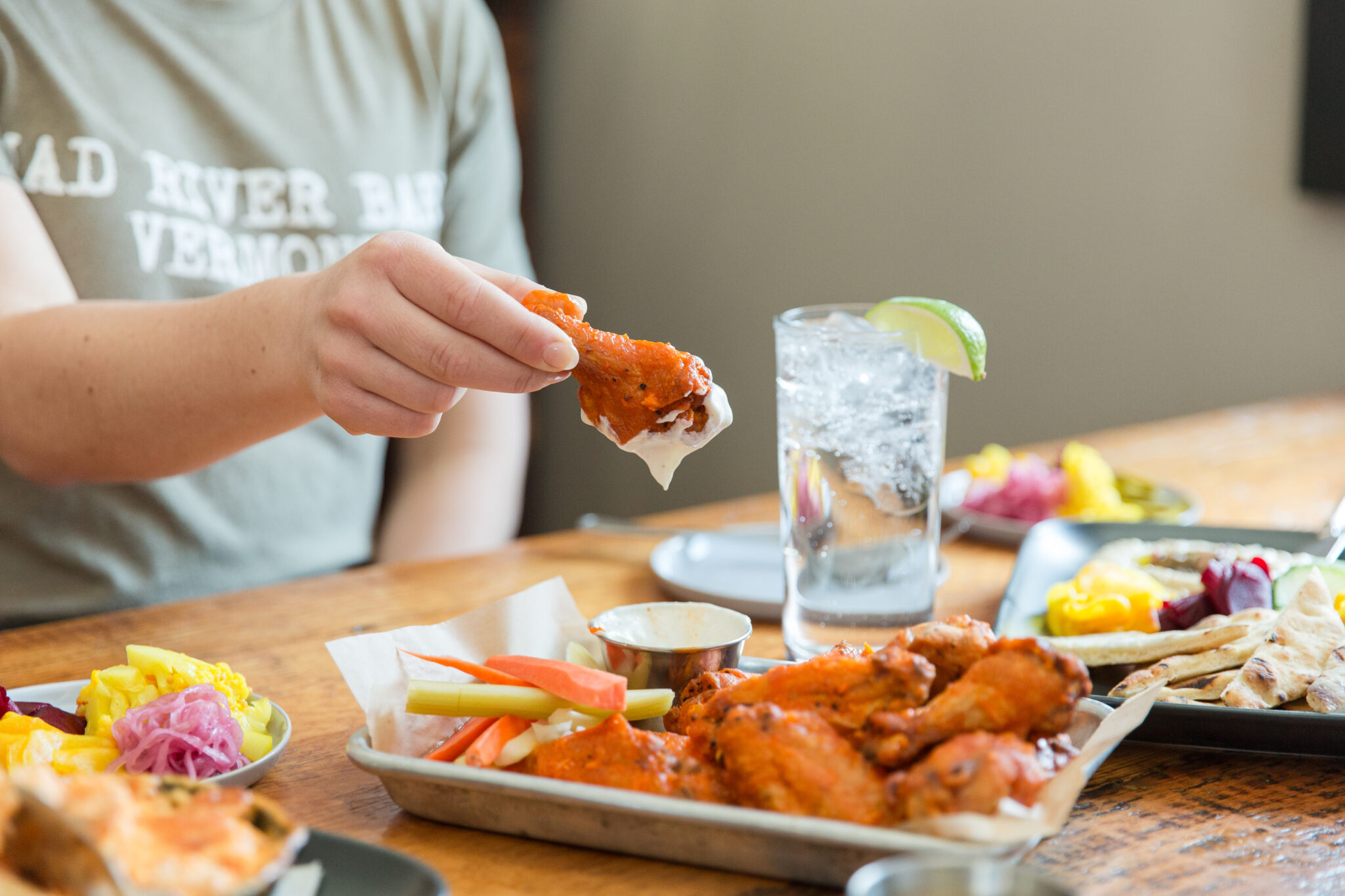 MRB buffalo wings dipped into bleu cheese